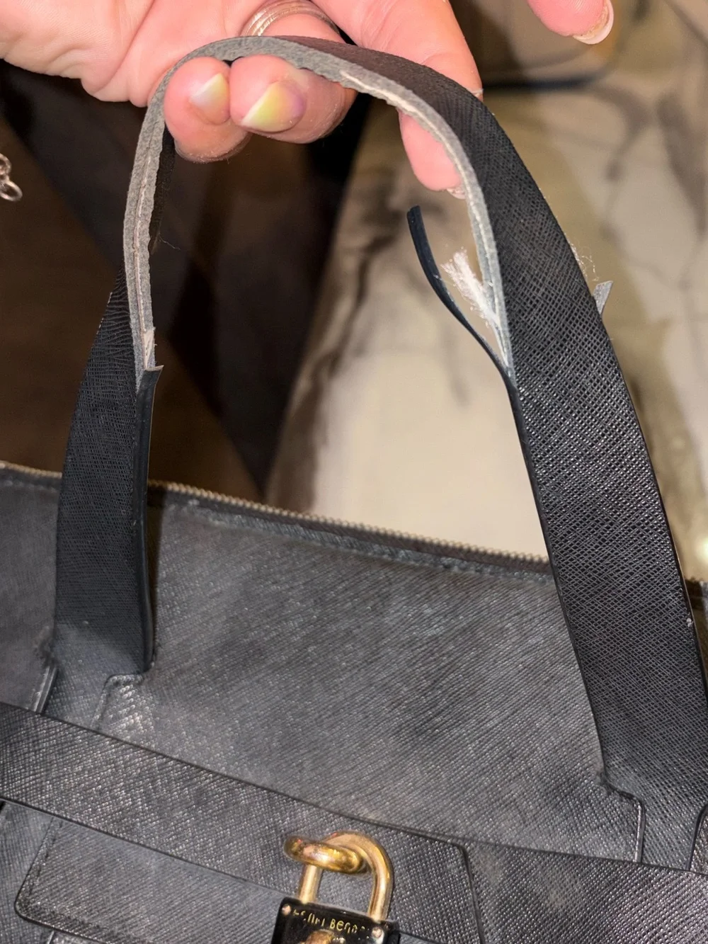 Henri Bendel jetsetter convertible backpack Wearing on the short straps